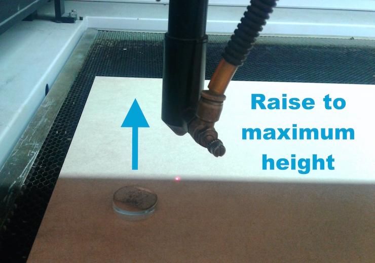 LaserCuttingMachine_Calibrating raising the laser